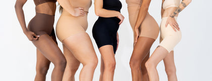 Mix race women wearing shapewear